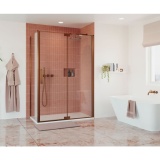 Lifestyle image of Crosswater Optix 10 Brushed Bronze Pivot Shower Door & Inline Panel